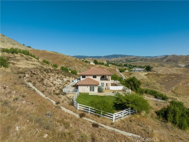 birds eye view of property featuring a rural view and a mountain view