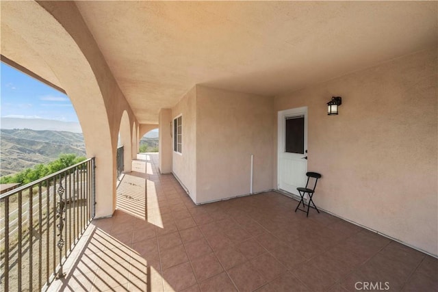 balcony featuring a mountain view