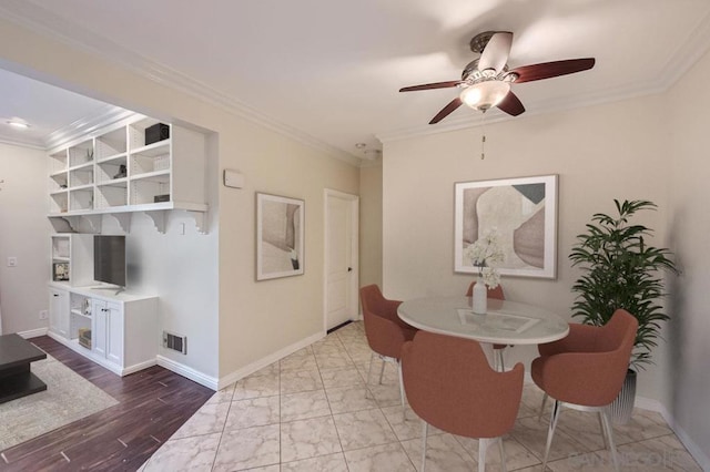 dining space with ceiling fan, crown molding, and wood-type flooring