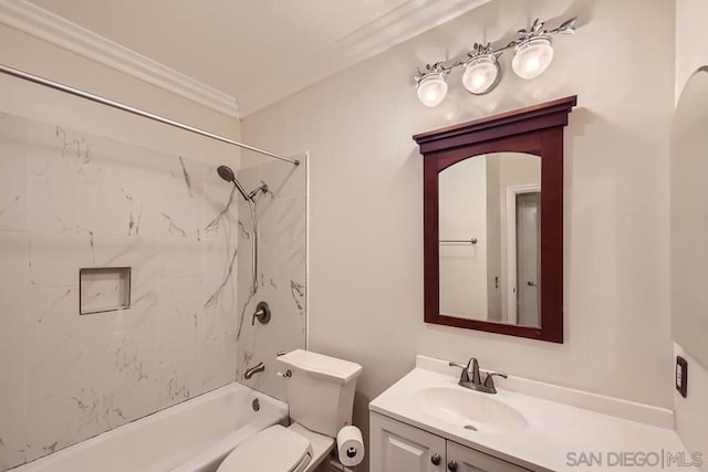 full bathroom with toilet, tiled shower / bath, vanity, and crown molding