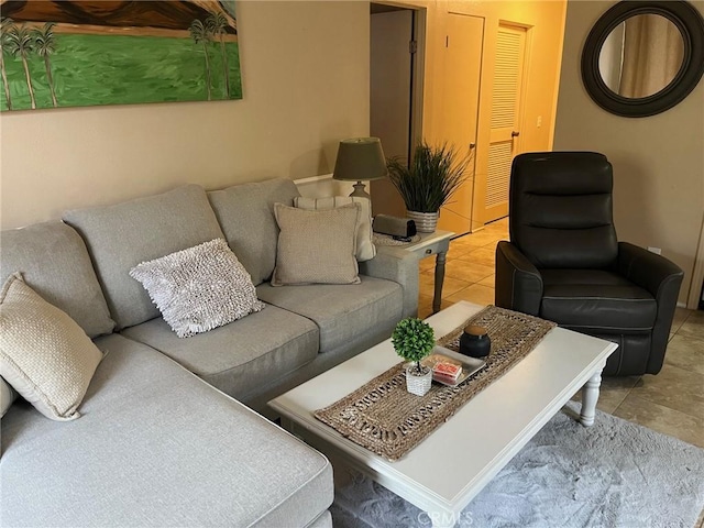 living area featuring light tile patterned floors