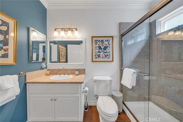 bathroom with toilet, a shower with shower door, tile patterned floors, ornamental molding, and vanity