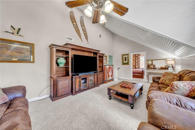 living room featuring carpet floors and ceiling fan