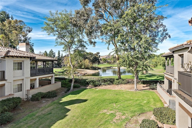 view of yard with a water view