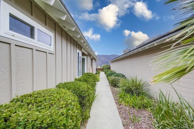 view of home's exterior with a mountain view