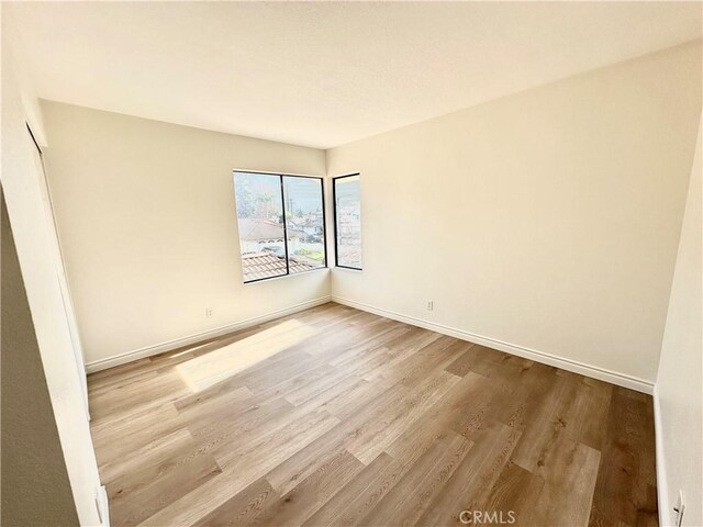 spare room with light tile patterned floors and ornamental molding