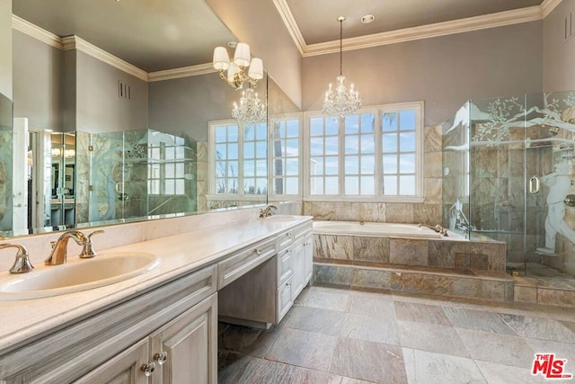 bathroom with independent shower and bath, a chandelier, ornamental molding, and vanity