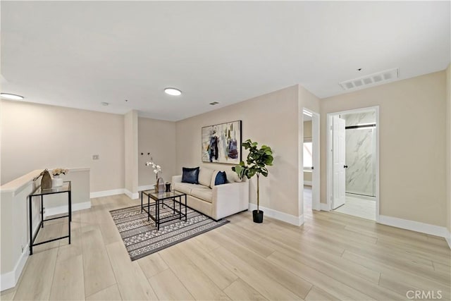 living room featuring light hardwood / wood-style floors