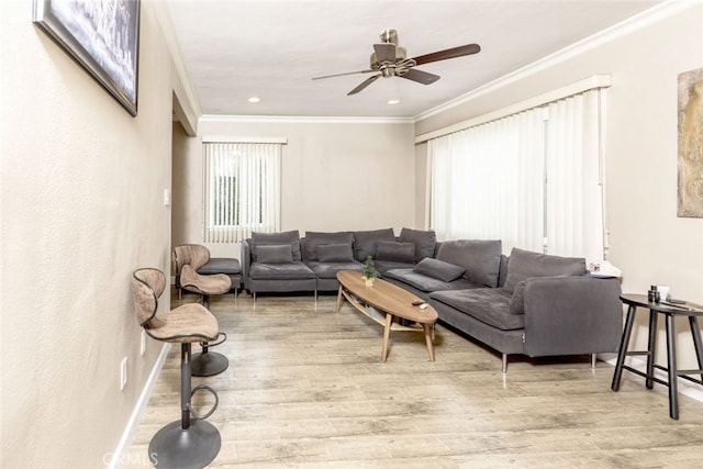 living room featuring hardwood / wood-style floors and ornamental molding