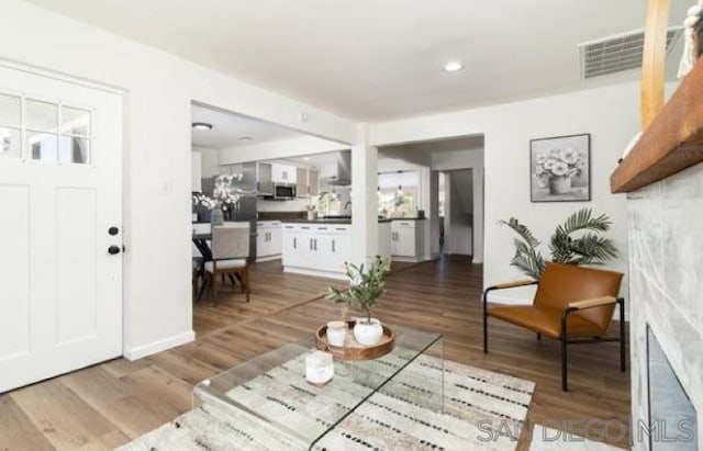 entrance foyer with hardwood / wood-style floors