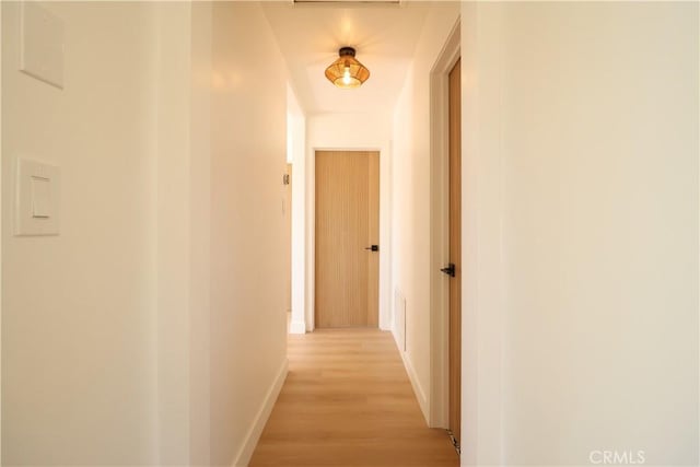 hallway featuring light hardwood / wood-style floors