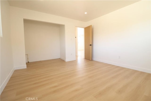 empty room featuring light hardwood / wood-style floors