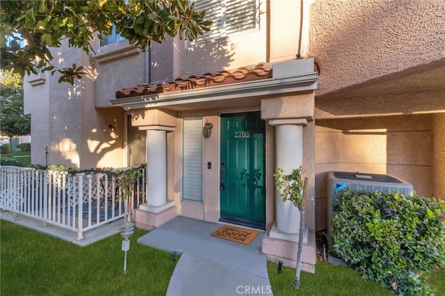 property entrance with covered porch