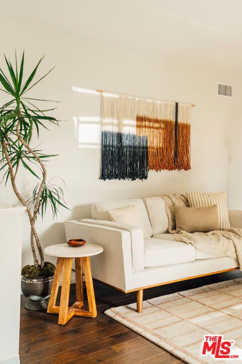 living room with hardwood / wood-style flooring