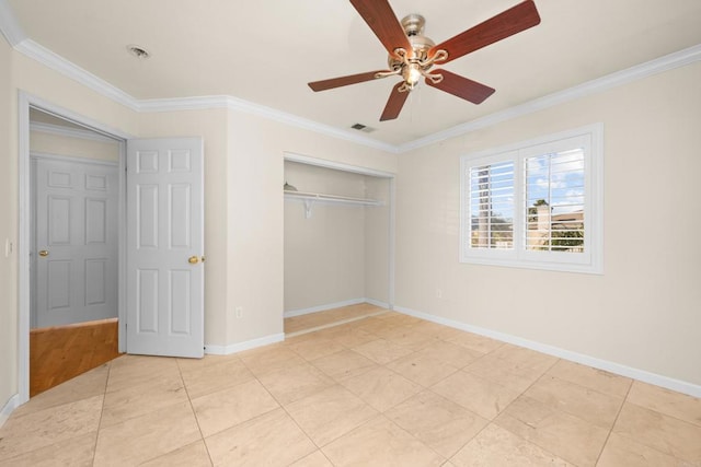 unfurnished bedroom with light tile patterned floors, ornamental molding, a closet, and ceiling fan