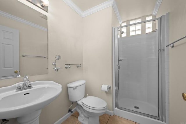 bathroom featuring crown molding, walk in shower, tile patterned flooring, and sink