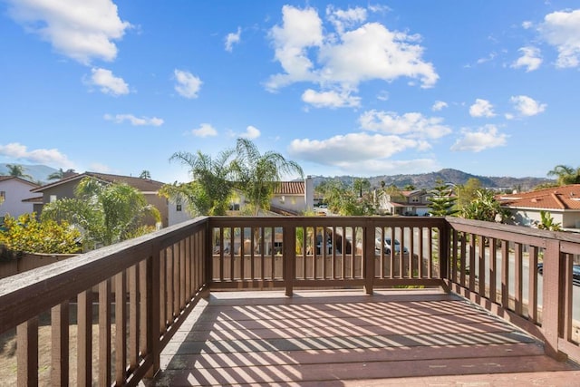 wooden deck featuring a mountain view