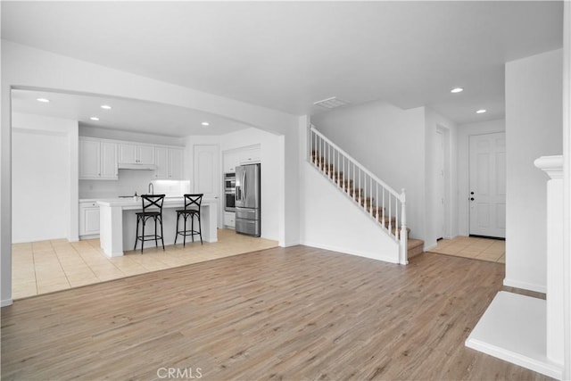 living room with light wood-type flooring