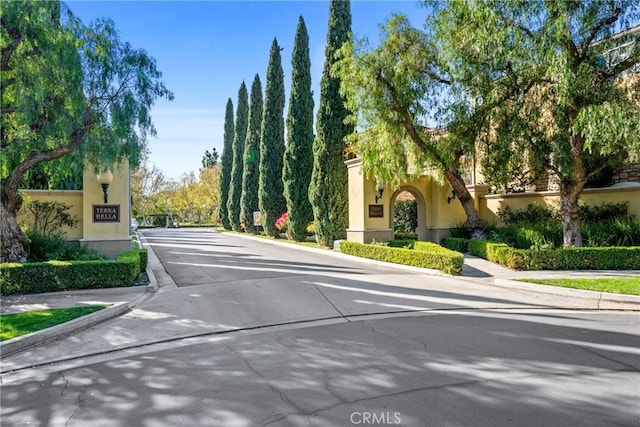 view of street featuring sidewalks and curbs