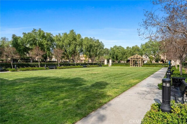 surrounding community featuring a yard and a gazebo