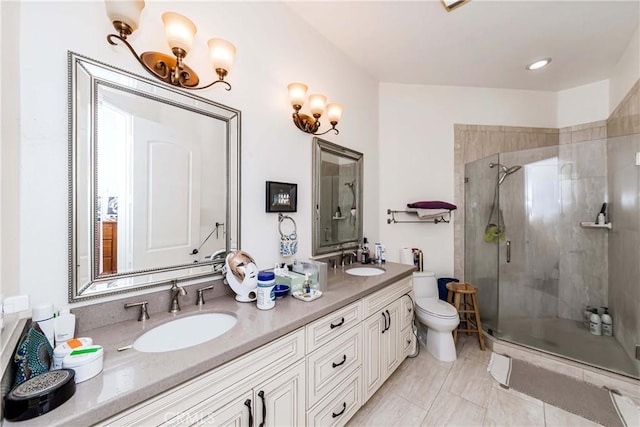 bathroom featuring vanity, toilet, and walk in shower