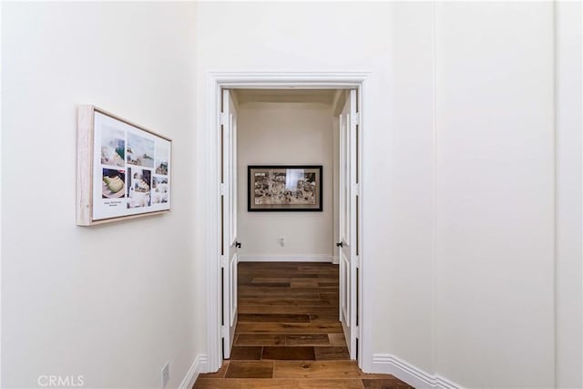 hall featuring dark hardwood / wood-style floors