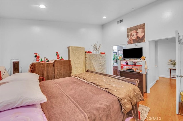 bedroom with light wood-type flooring