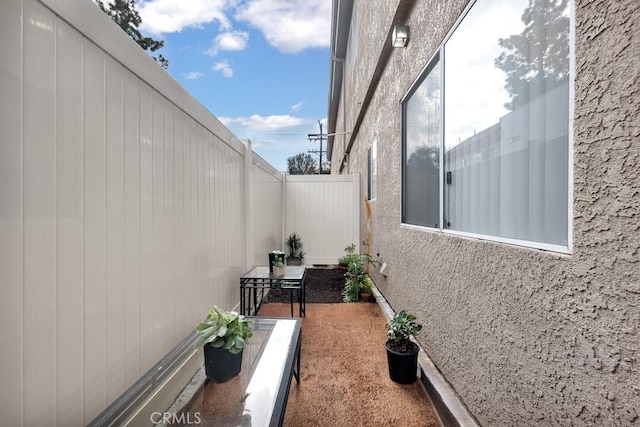 view of patio with fence