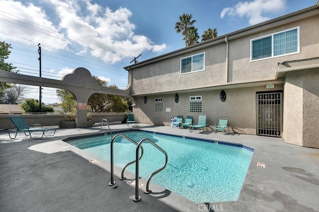 pool featuring a patio