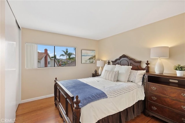 bedroom featuring hardwood / wood-style flooring