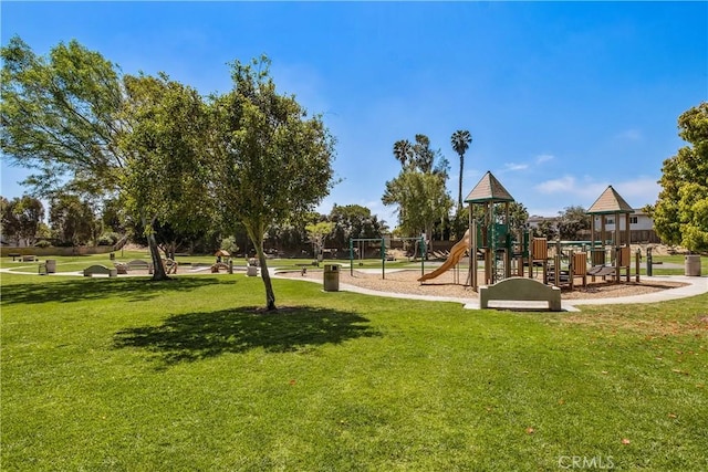 view of jungle gym with a lawn