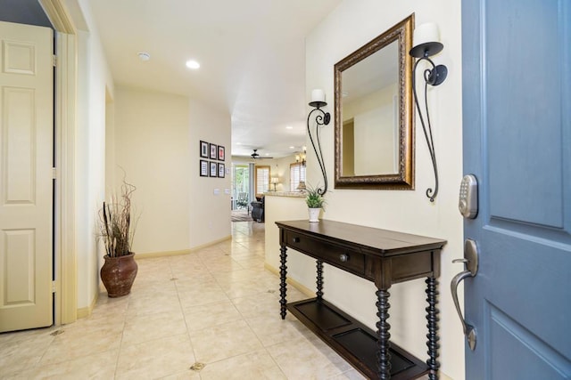 hallway with light tile patterned floors