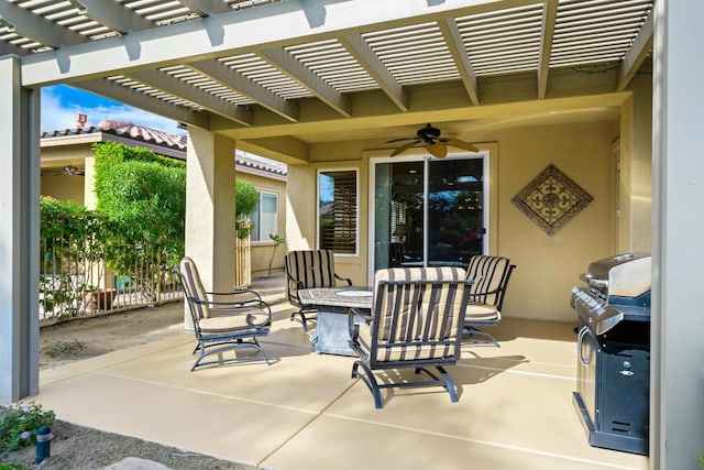 view of patio / terrace featuring ceiling fan and a pergola