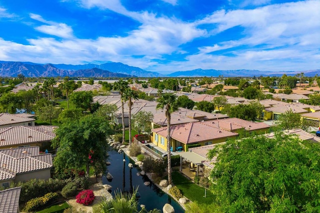 bird's eye view with a mountain view