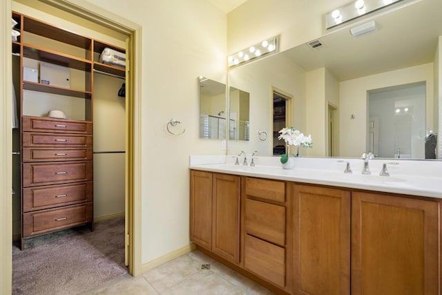 bathroom featuring vanity and tile patterned flooring