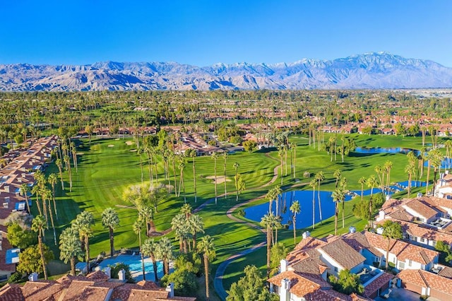 bird's eye view with a water and mountain view