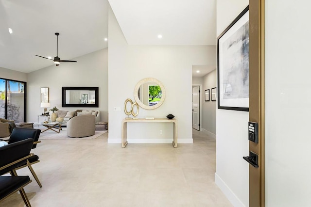 interior space featuring lofted ceiling and ceiling fan