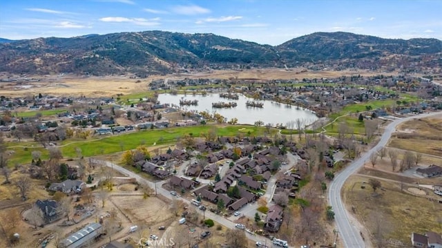 aerial view with a water and mountain view