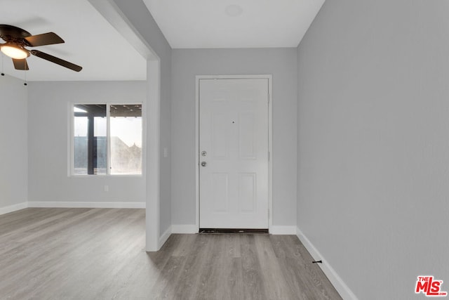 foyer entrance featuring ceiling fan and light hardwood / wood-style flooring