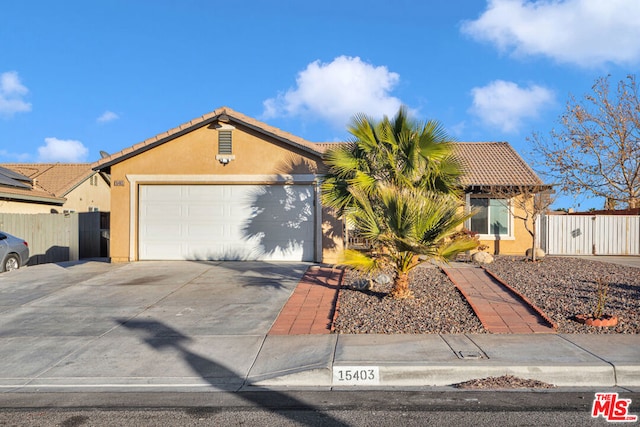 single story home with a garage