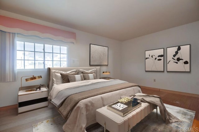 bedroom featuring hardwood / wood-style flooring