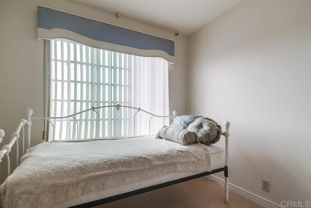 bedroom with lofted ceiling