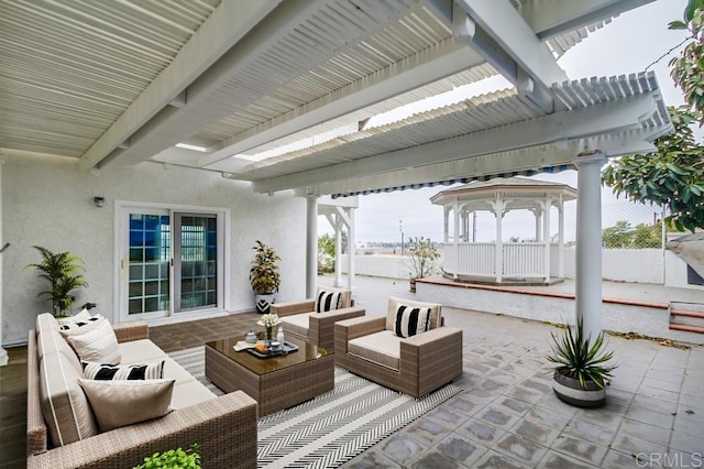 view of patio / terrace with a gazebo and an outdoor living space