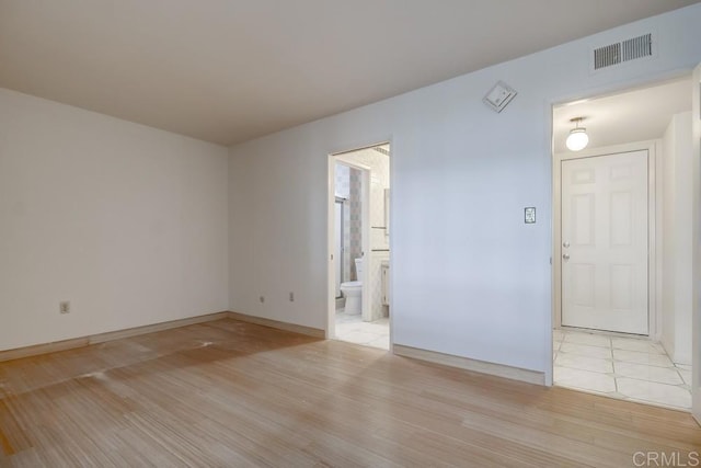 empty room featuring light hardwood / wood-style flooring