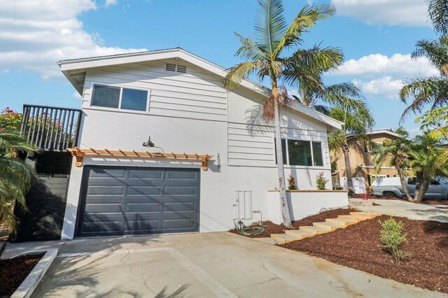 view of front of home with a garage