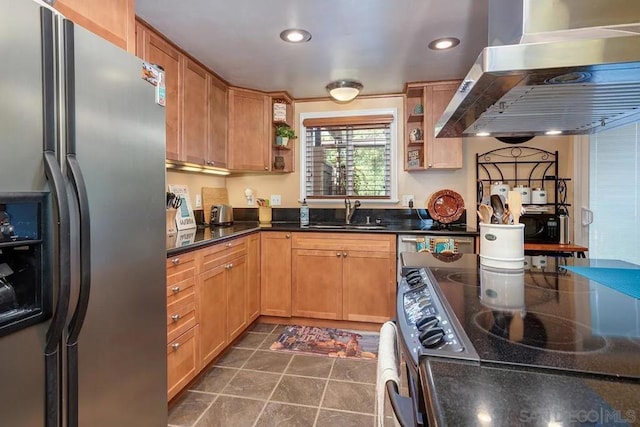 kitchen featuring sink, appliances with stainless steel finishes, and island range hood