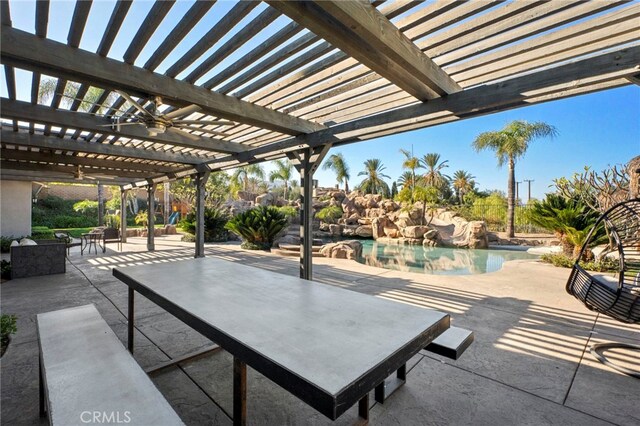 view of patio with ceiling fan and a pergola