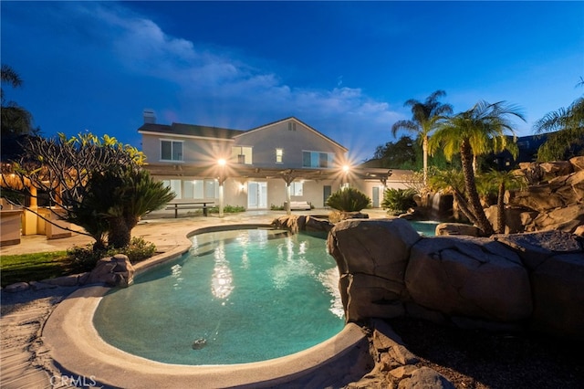 view of swimming pool with a patio