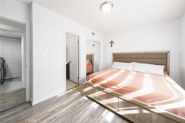 unfurnished bedroom with hardwood / wood-style flooring