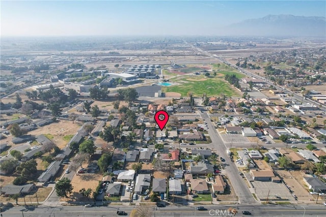 drone / aerial view featuring a mountain view